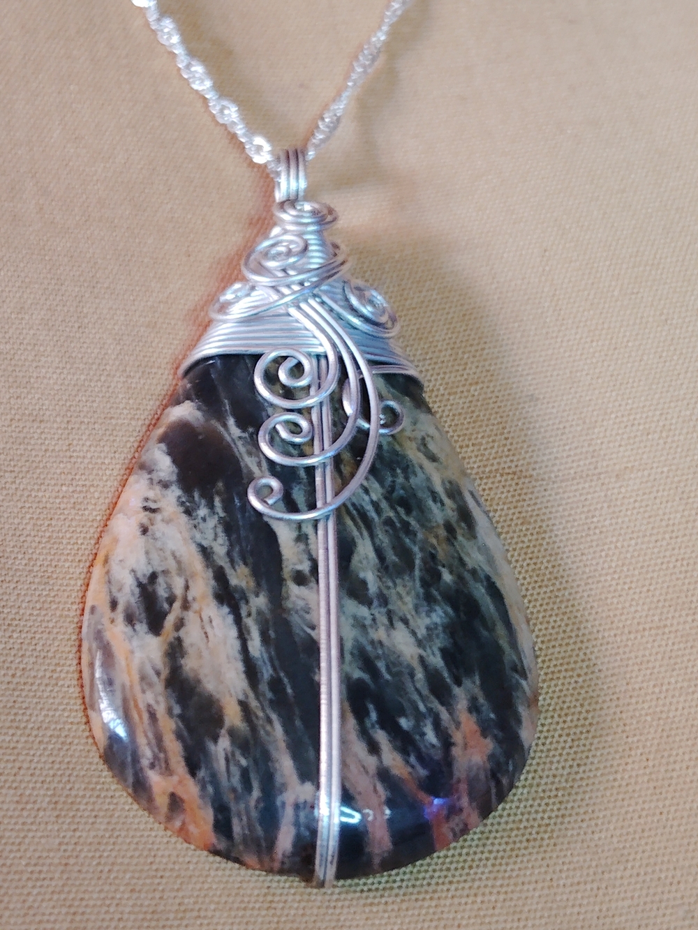 TEARDROP BROWN & TAN TURKISH AGATE. STERLING PENDANT, WITH STERLING WIRE WRAP.